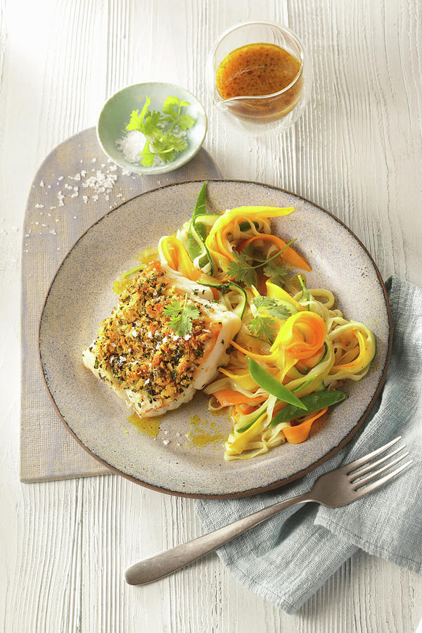 Fish Fillet With A Herb And Orange Crust And Vegetables Noodles Photograph by Uwe Bender
