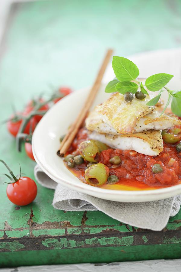 Fish Fillets On Tomatoes With Green Olives Photograph by Tanja Major ...