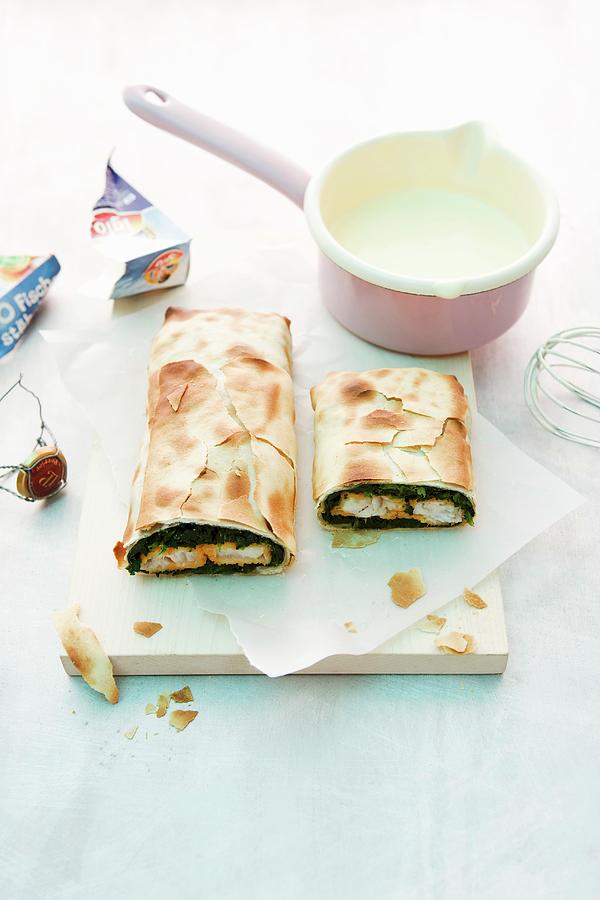 Fish Finger And Spinach Strudel With Champagne Sabayon Photograph by Michael Wissing