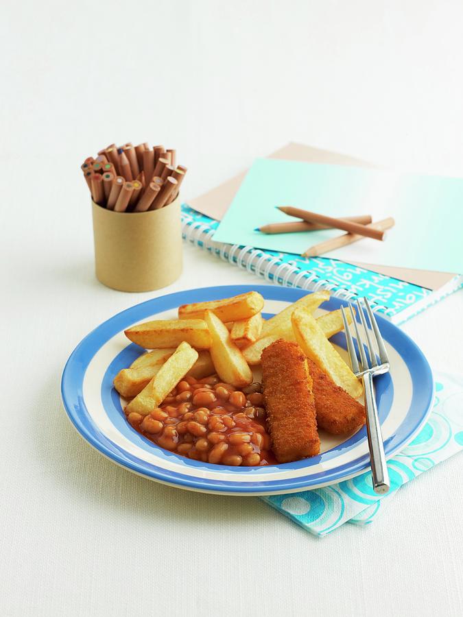 Fish Fingers With Baked Beans And Chips Photograph by Geoff Fenney