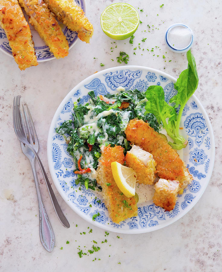 Fish Fingers With Creamy Spinach Photograph by Udo Einenkel