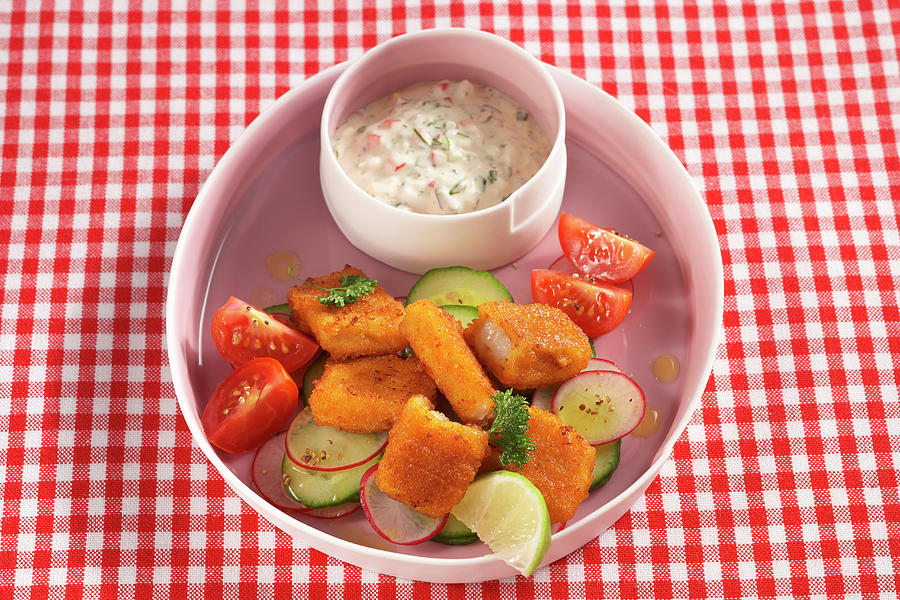 Fish Fingers With Cucumber Salad And Yogurt Mayo Dressing Photograph by Teubner Foodfoto