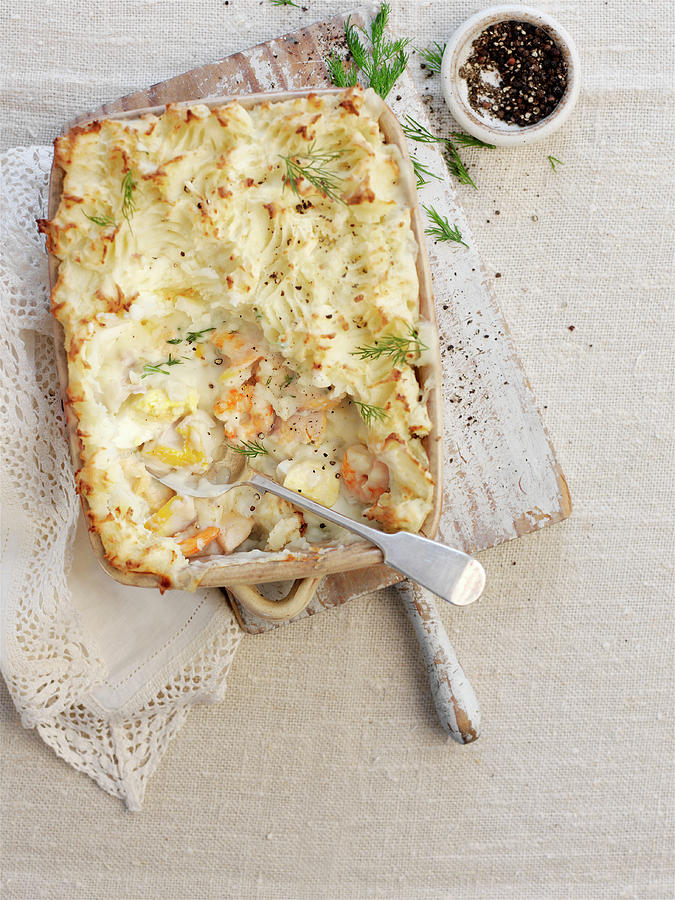 Fish Pie On White Board Photograph by Ian Garlick