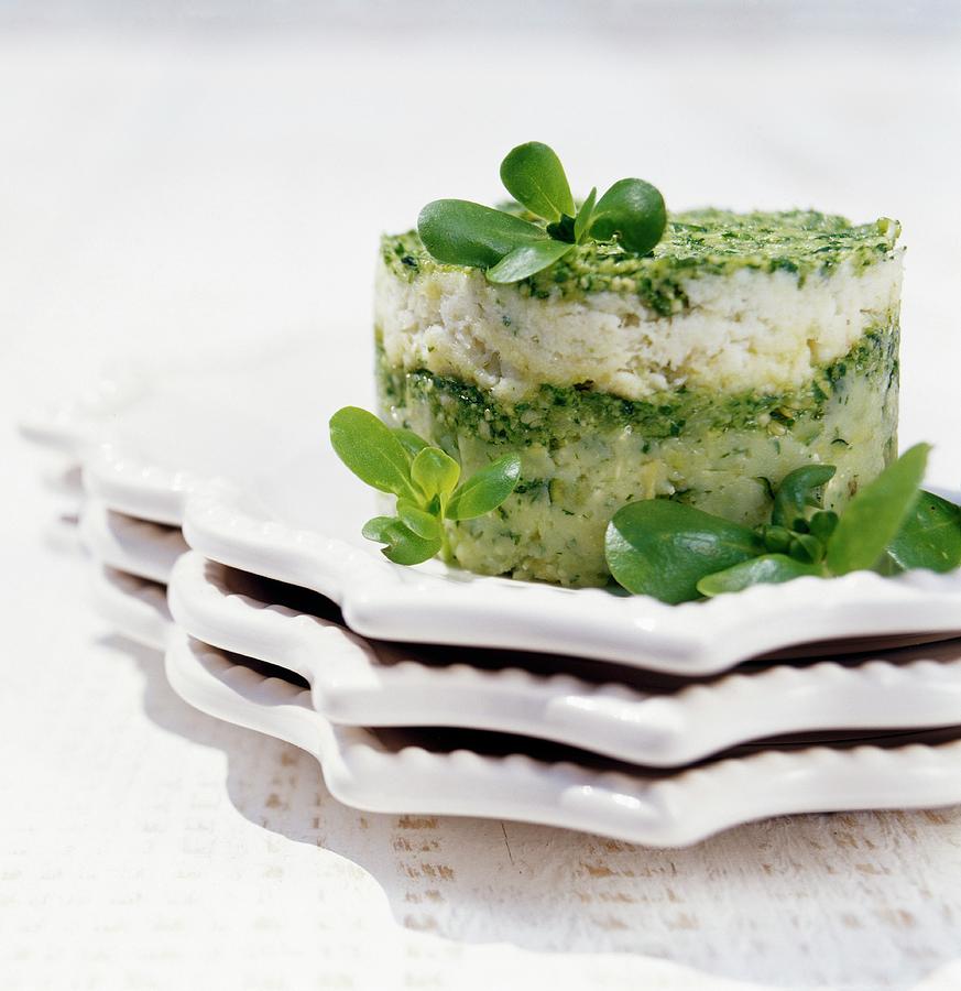 Fish Pure And Courgette Timbale With Rocket Pesto Photograph by Langot