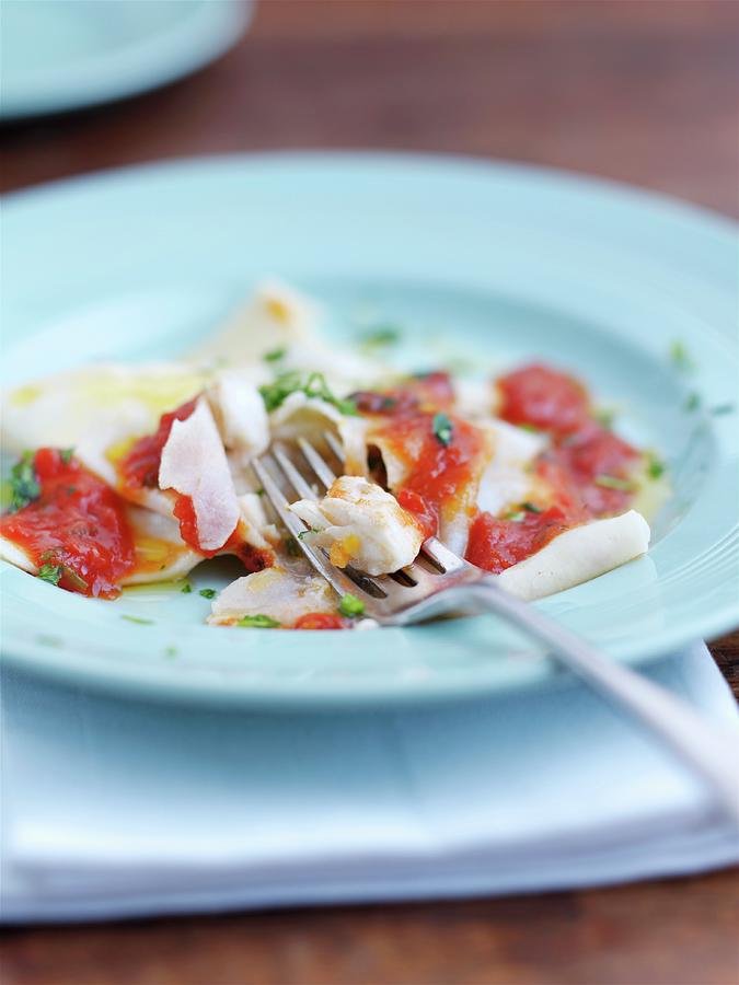 Fish Ravioli With Tomato Sauce Photograph by Garlick, Ian
