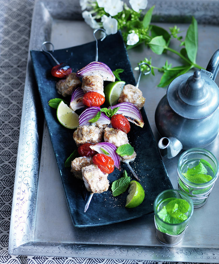 Fish Skewers With Red Onions And Limes, With Peppermint Tea Photograph by Karen Thomas