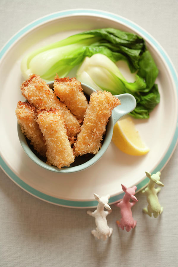 Fish Sticks With Pak Choy Photograph by Colin Cooke
