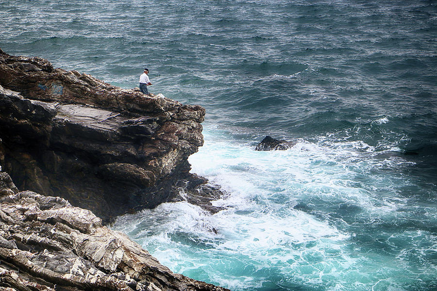 Fisher on the rock by Luisa Vallon Fumi Fisher on the rock by Luisa Vallon Fumi