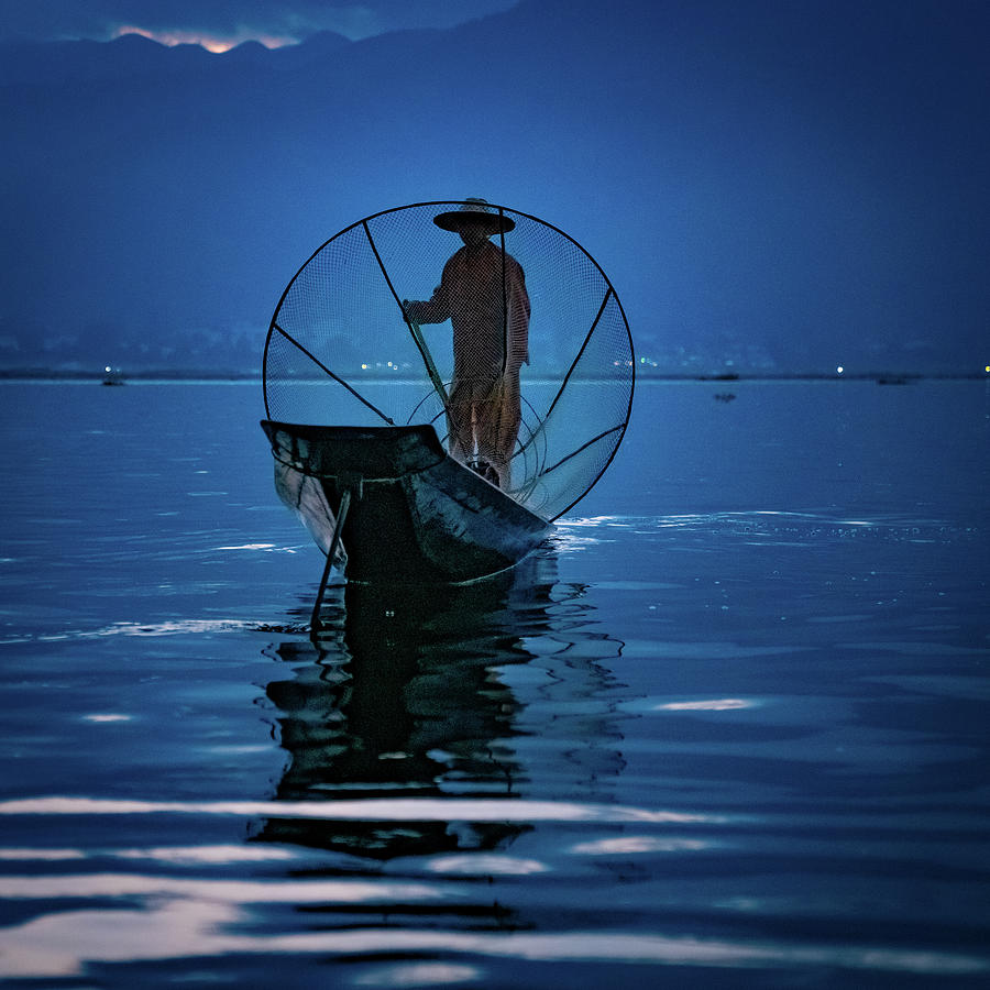 Fisherman At First Light On Inle Lake Photograph by Chris Lord