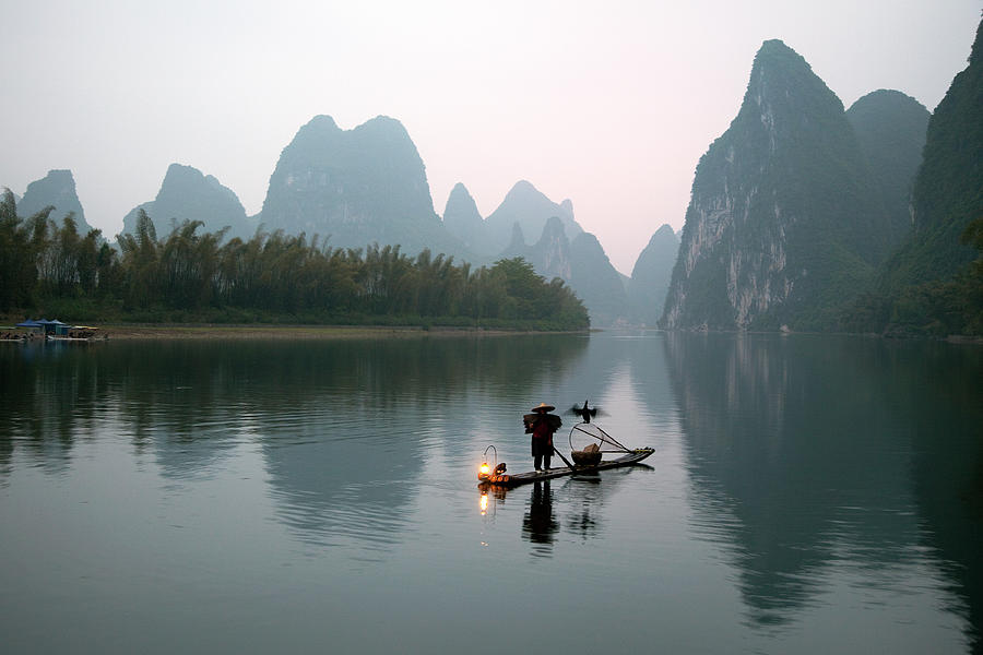 Fisherman In China Photograph by Kingwu