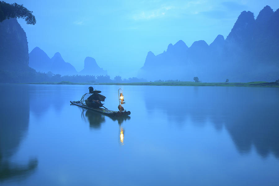 Fisherman On Li River Photograph by Bihaibo