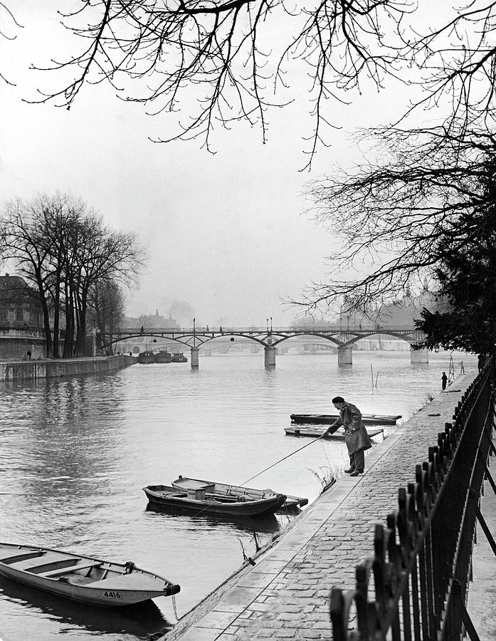 Fisherman on the Seine Photograph by Ed Clark