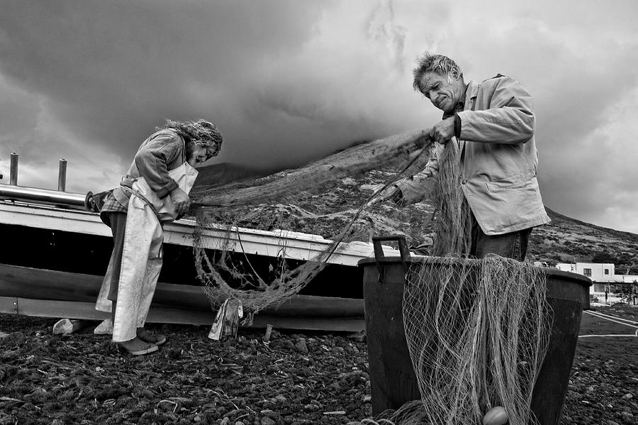 Black And White Photograph - Fishermen by Jure Kravanja