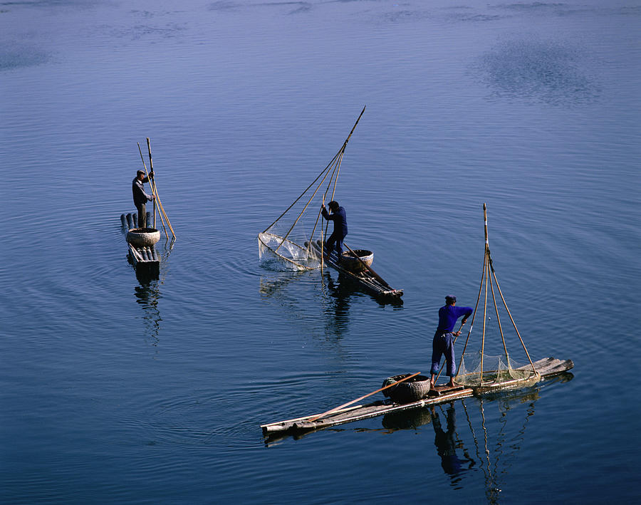 Fishermen On Li River Photograph by Manfred Gottschalk
