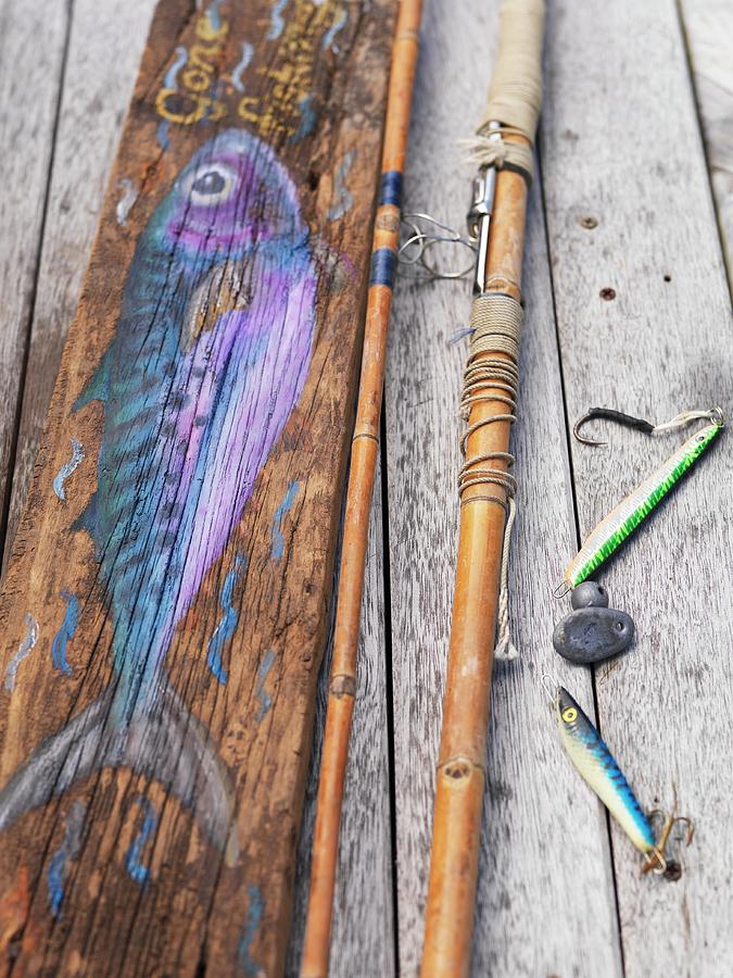 Fishhooks And Fishing Rod Photograph by Shaun Cato-symonds