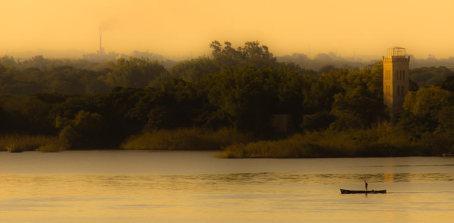 Fishing At Sunset Photograph by Lisandro Trarbach