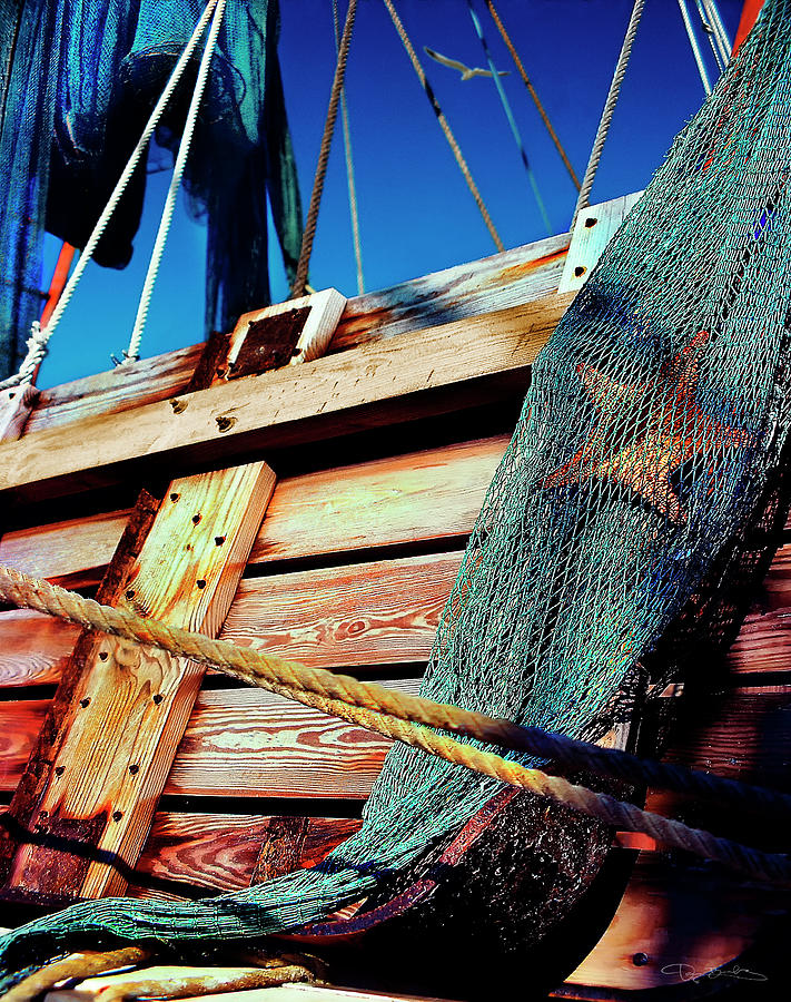 Fishing Boat Wood And Sea Star In Fishing Net Photograph by Dan Barba
