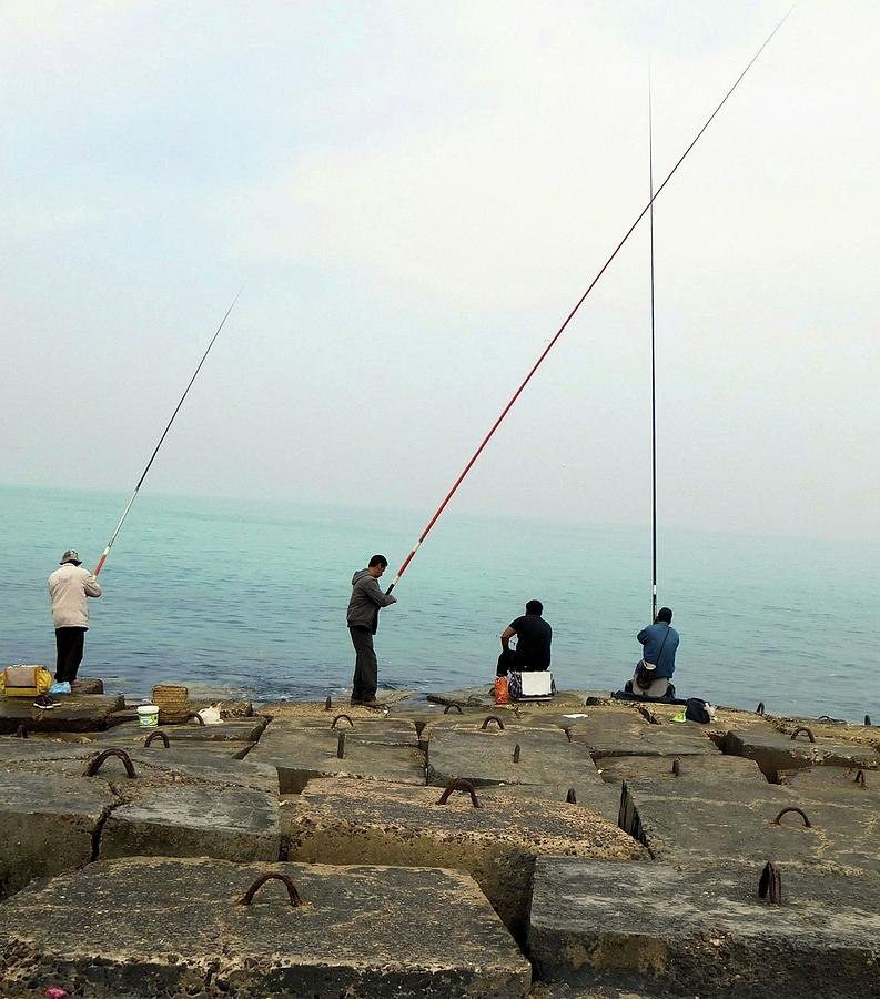 Fishing on the Mediterranean Photograph by Karen Stansberry