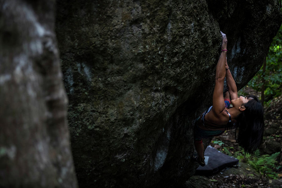 Healthy Photograph - Fit Young Woman Bouldering In Hawaiian Rainforest by Cavan Images