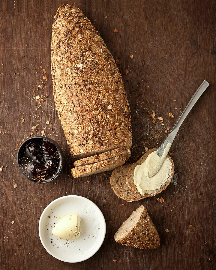 Five-grain Bread With Butter Photograph by Great Stock!