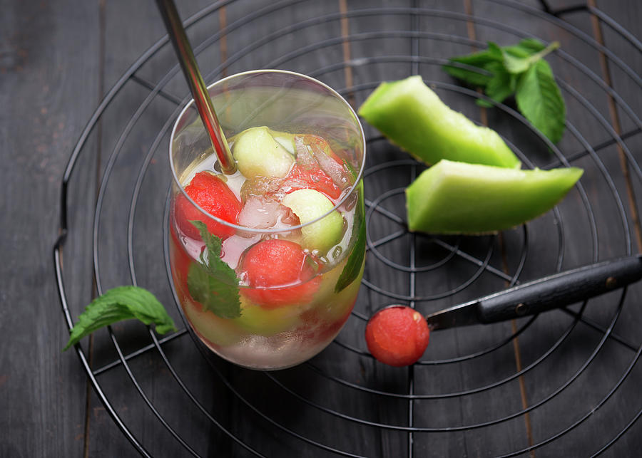 Fizzy White Wine Sangria With Watermelon And Melon Balls Photograph by Kati Neudert