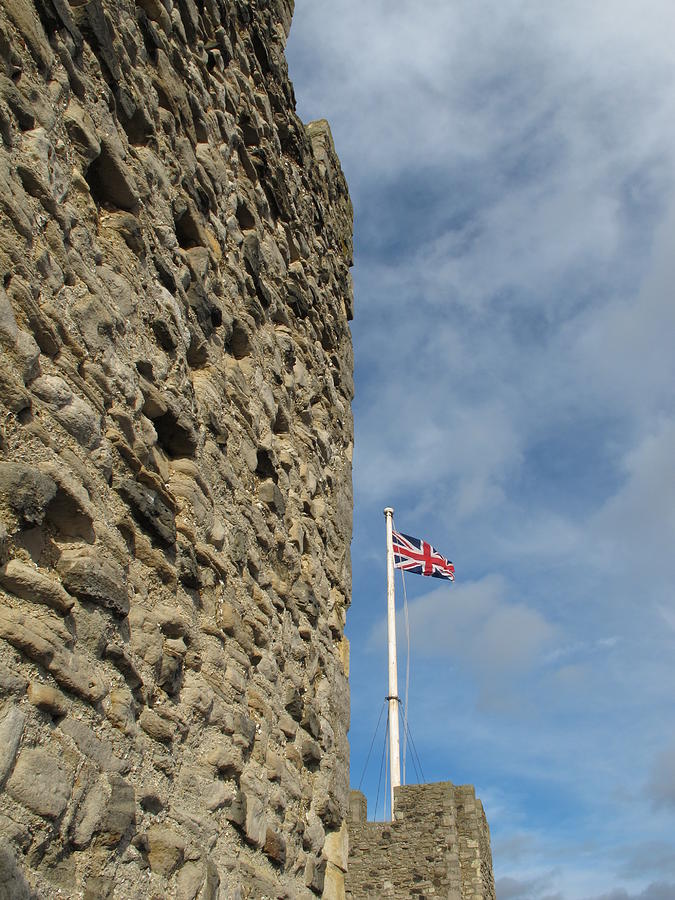 Flag And Castle Wall Photograph by David M. Davies