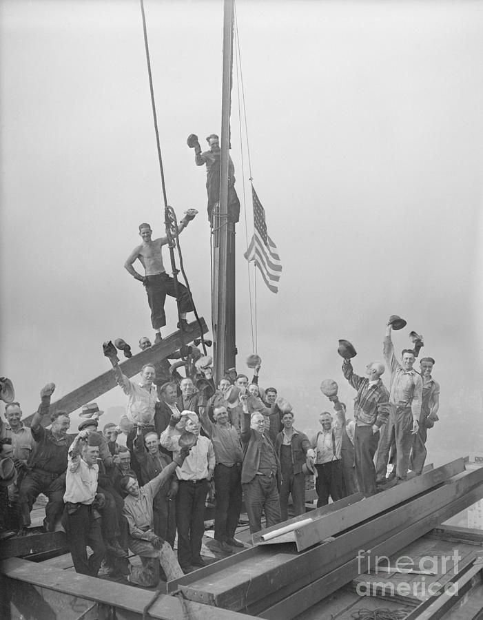Flag Raising At Rockefeller Center Photograph by Bettmann