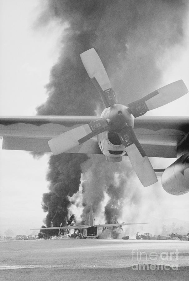 Flames And Smoke Rising From C-130s Photograph by Bettmann