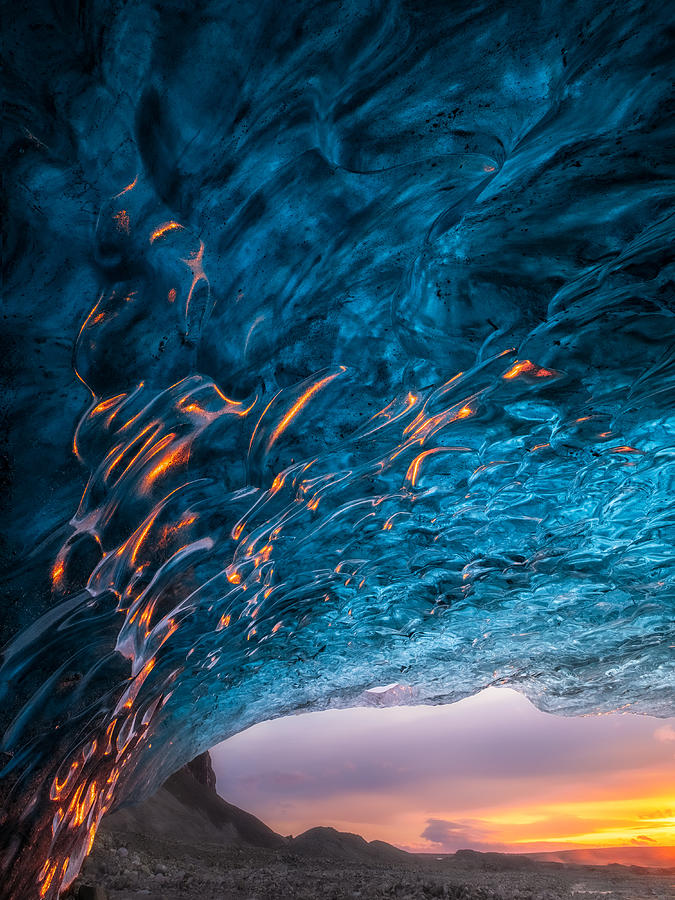 Flames Dancing In The Ice, Blue Ice Cave In Iceland. Photograph by Xiawenbin