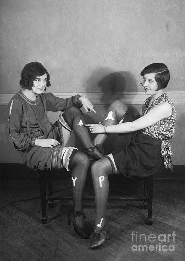 Flappers Show Off Embroidered Stocking Photograph by Bettmann