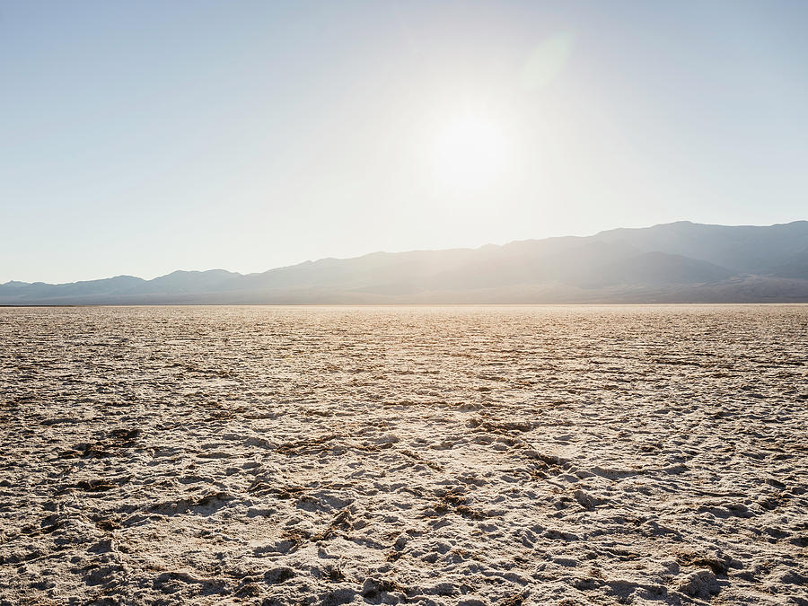 Death Valley National Park Digital Art - Flat Dry Mud Landscape At Badwater Basin In Death Valley National Park, California, Usa by Manuel Sulzer