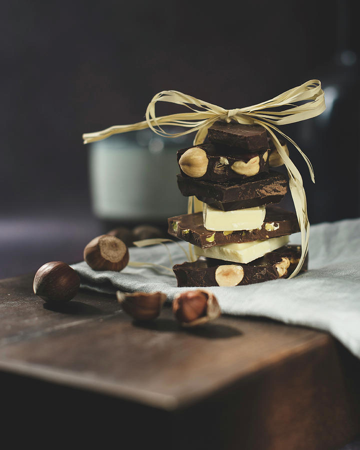 Flavour Chocolate Pieces Stacked One Over Another Photograph by Valentina T.