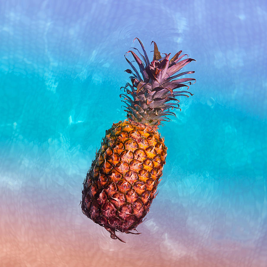Pineapple Photograph - Floating Colorful Pineapple by Angelina Hills