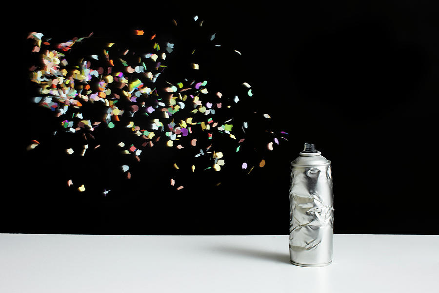 Floating Confetti And A Damaged Spray Photograph by Benne Ochs