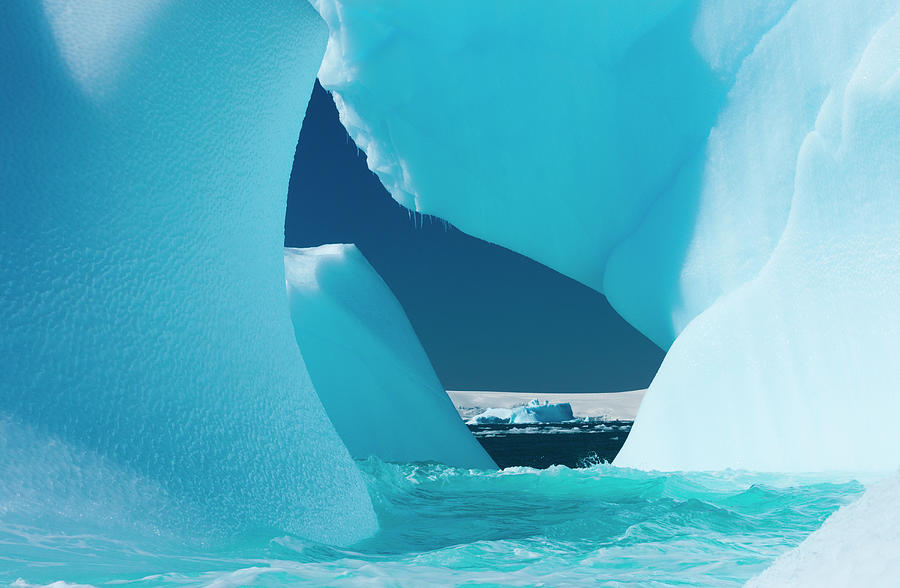 Floating Icebergs Framing A View Of The Photograph by Mint Images/ Art Wolfe