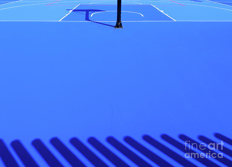 Floor background of an intense blue sports field with white line Photograph by Joaquin Corbalan