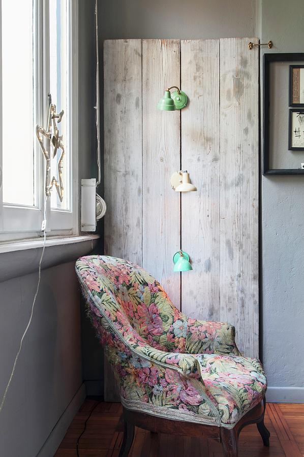 Floral Armchair In Front Of Retro Reading Lamps Mounted On Rustic Wooden Boards Photograph by Andrea Cuscuna