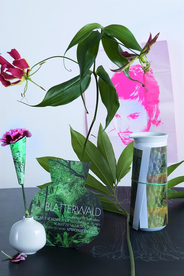 Floral Arrangement With Vase Shape Cut Out Of Magazine Photograph by Matteo Manduzio