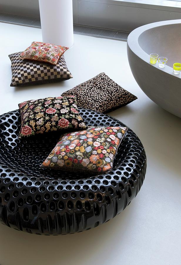 Floral Cushions On Black Designer Stool Photograph by Matteo Manduzio
