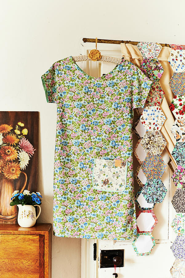 Floral Summer Dress On Coat Hanger And Fabric Swatches Photograph by Catherine Gratwicke