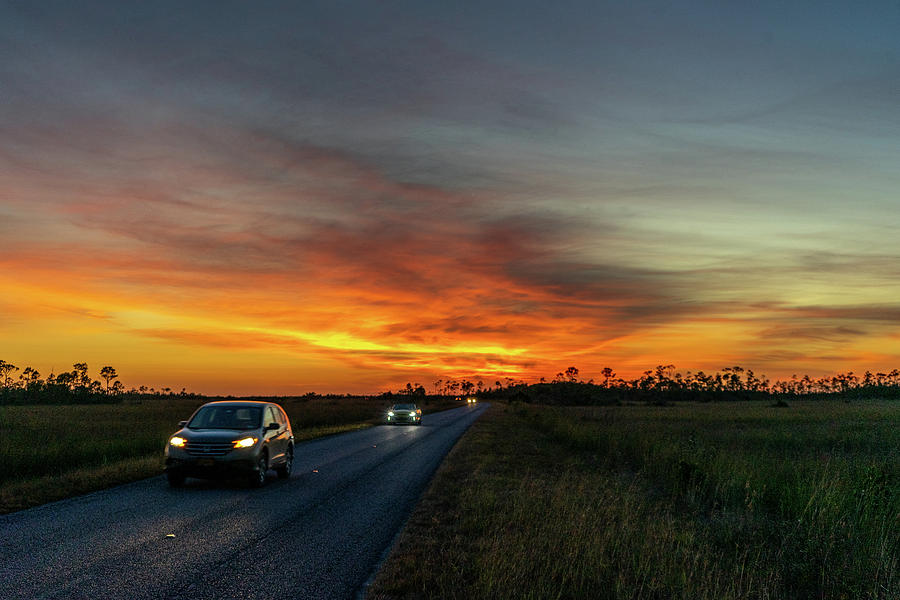 Sunset Photograph - Florida Everglades road  by Manuel Lopez