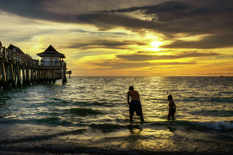Florida, Naples, Fishing Pier, Playing On The Beach Digital Art by Gabriel Jaime Jimenez