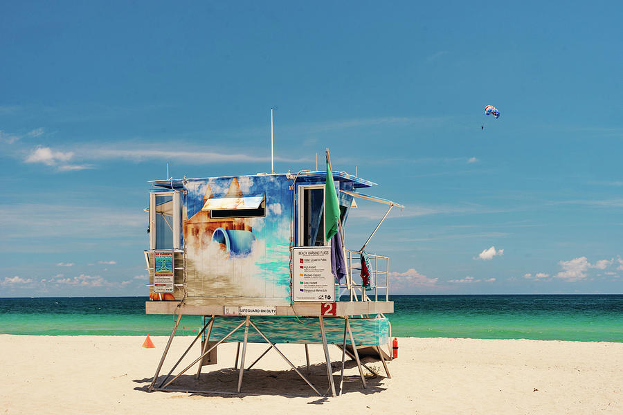 Florida, South Florida, Fort Lauderdale Beach, Lifeguard Station With Tourists Parasailing Digital Art by Gabriel Jaime Jimenez