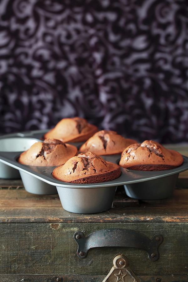 Flourless Honey-orange Chocolate Muffins In A Muffin Tray Photograph by Yelena Strokin