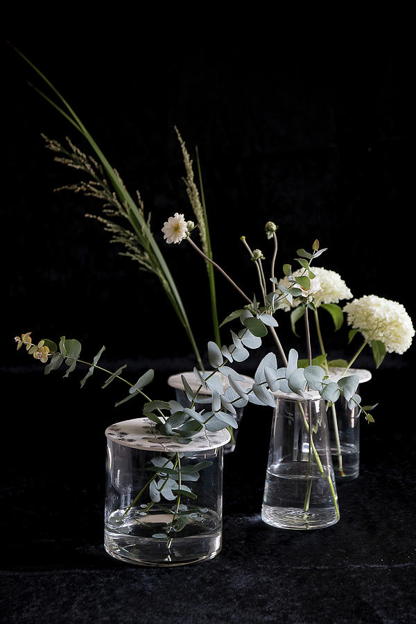 Flower Arrangements In Vases With Perforated Lids Made From Modelling Clay Photograph by Astrid Algermissen