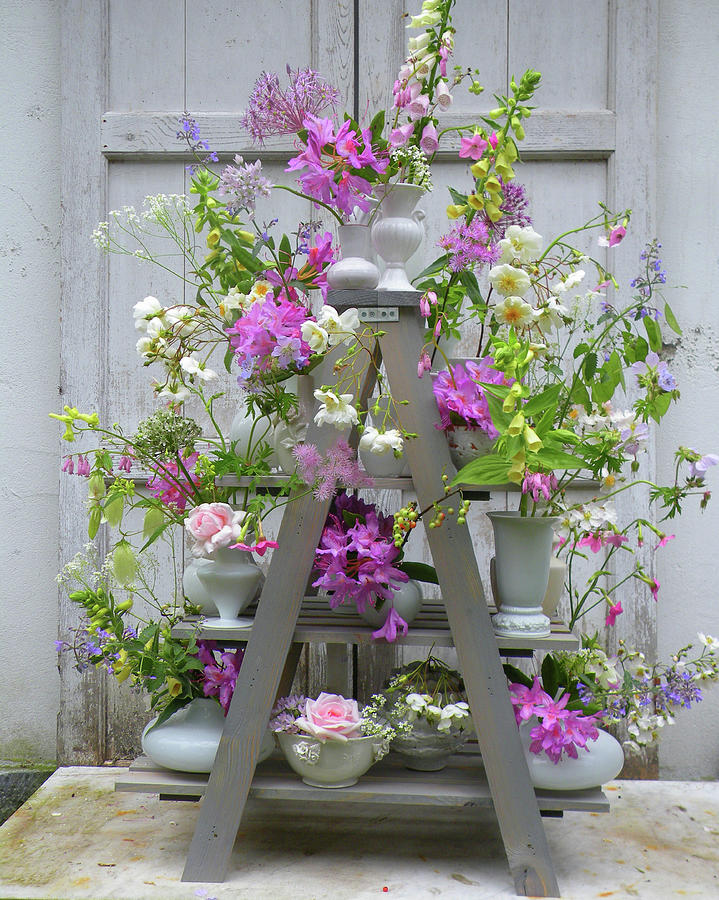 Flower Photograph - Flower Decoration With Foxglove digitalis Lutea On A Tiered Stand by Marieke Nolsen