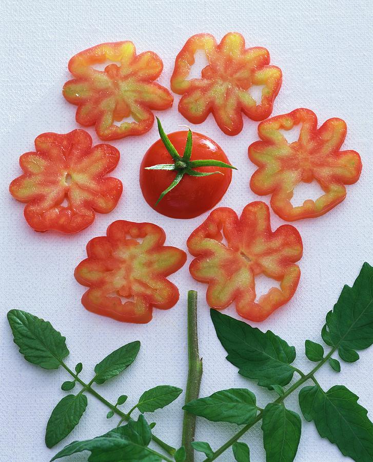 Flower Formed From Tomato, Tomato Slices And Tomato Leaves Photograph by Strauss, Friedrich
