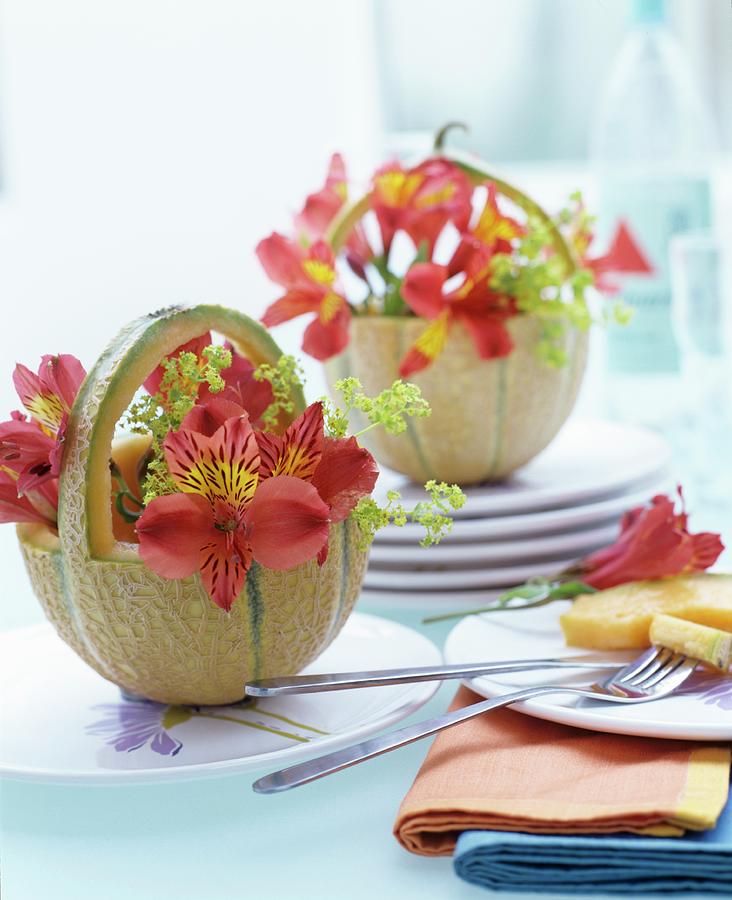 Flowers In Baskets Carved From Melons As Table Centrepieces Photograph by Matteo Manduzio