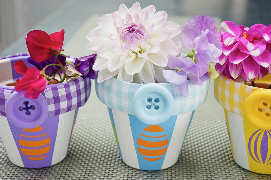 Flowers In Plant Pots Decorated With Buttons Photograph by Linda Burgess