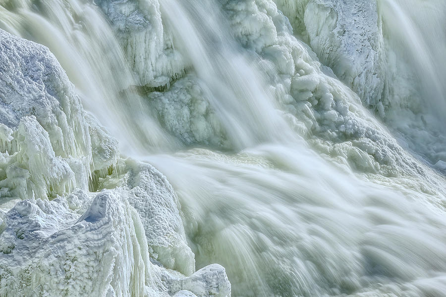 Landscape Photograph - Flowing Through A World Of Ice by Lucie Gagnon